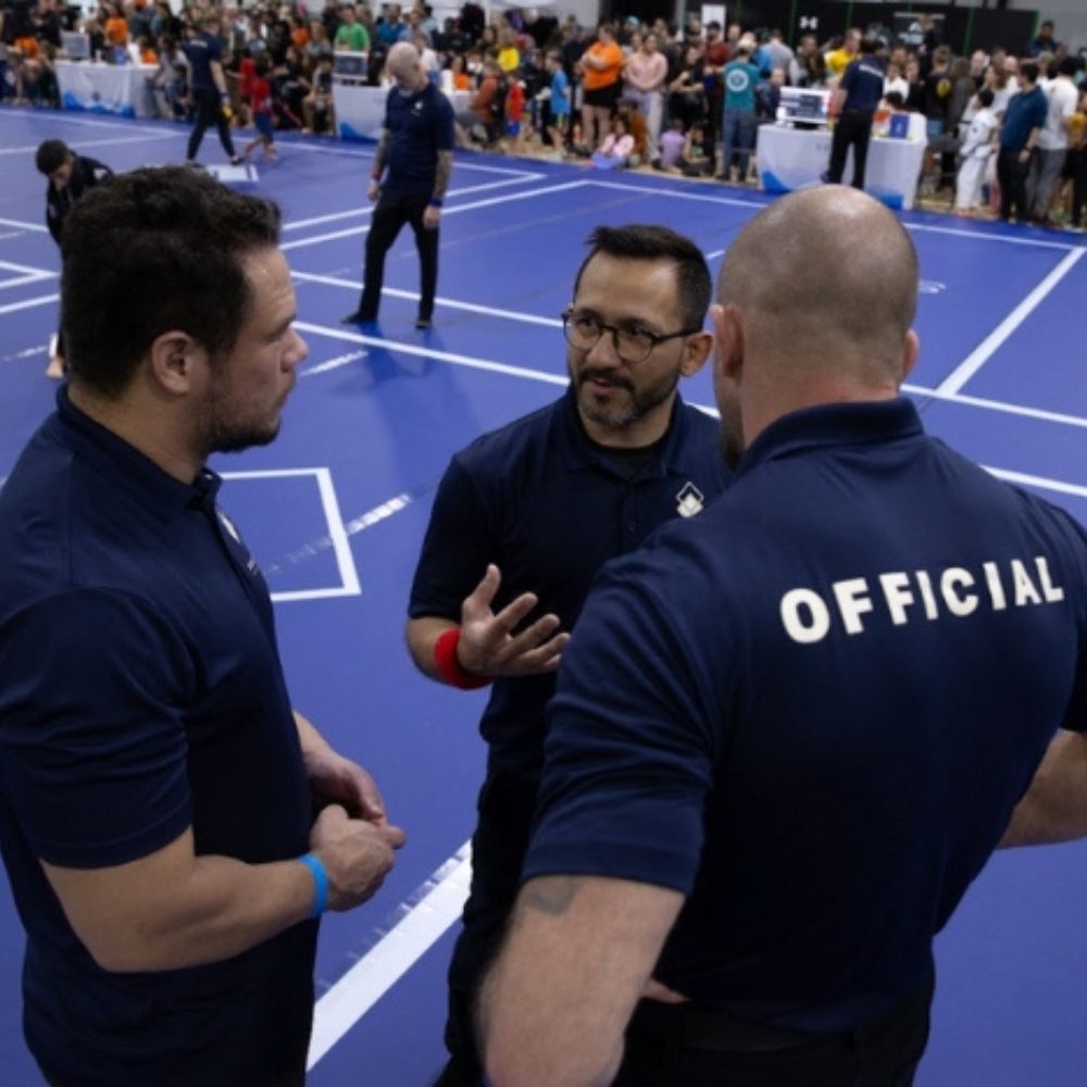 Solid Series referee on the mat